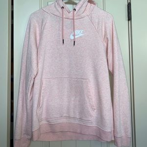 light pink nike sweatshirt, fits really small